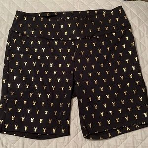 Black and gold medal Oiselle spandex shorts